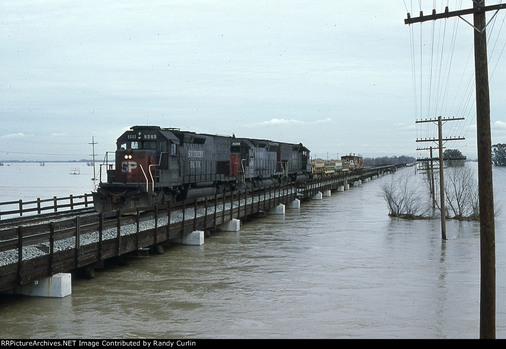 SP 8545 on work train during floods